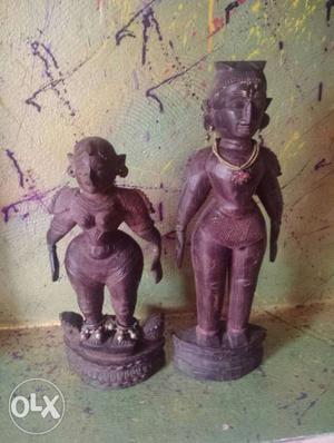 Two Woman Brown Concrete Statues
