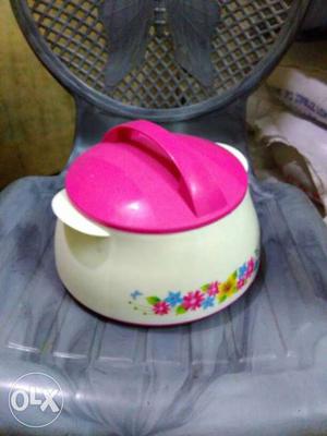 White And Pink Plastic Container