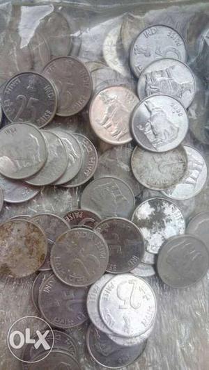 25 coins of 25 paisa