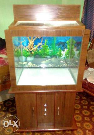 Aquarium with wooden table wooden side and wooden