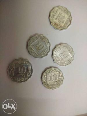 Five Scallop Edge Silver-colored pakistani Coins 