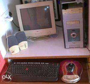 A Desktop PC with CRT monitor, keyboard, mouse,