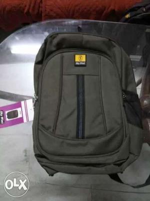Black And Gray Zip-up Backpack