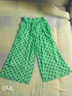 Fluorescent green with blue dots has got lining