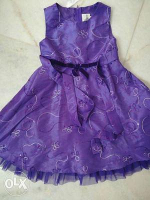 Purple party dress for 4 to 5 years girl child.