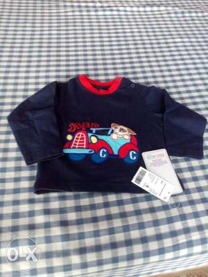 Toddler's Blue And Red Sweater