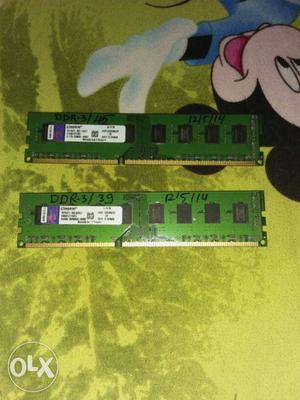 Two Green DIMM RAM Sticks