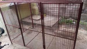 A good condition dog cage is for sale
