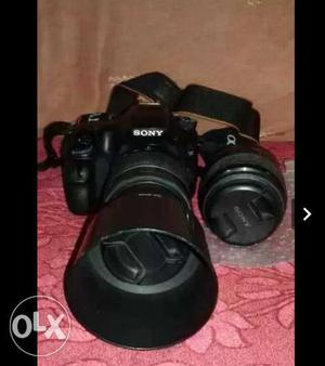 Black Sony DSLR With Two Lenses Sony alpha 58
