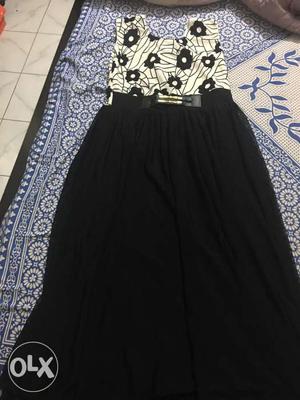 Black and white party wear dress, with a belt,