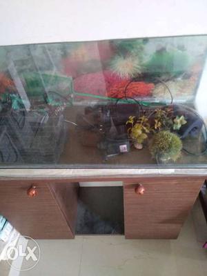 Fish tank with Brown And White Wooden Cabinet