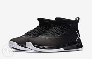 Pair Of Black-and-white Air Jordan Basketball Shoes