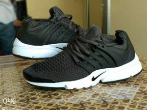 Pair Of Black-and-white Nike Presto Running Shoes