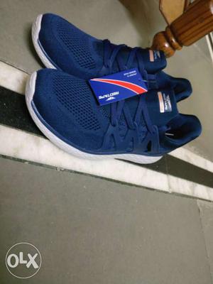 Pair Of Blue Running Shoes