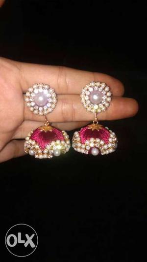 Pair Of Red And Beige Beaded Jhumka Earrings