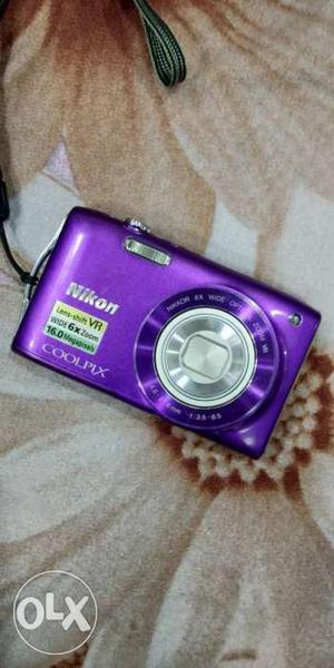 Purple Nikon Coolpix Point-and-shoot Camera