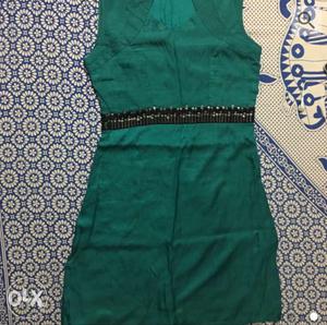 Sea green color western outfit of medium size,