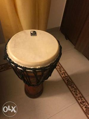 A 12” wooden Toca Djembe with bag 6 months old