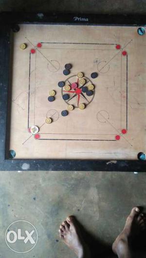 Black And Brown Carrom Board