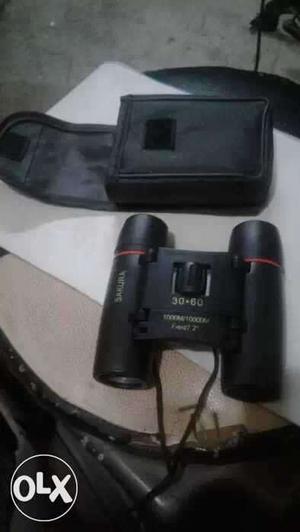 Black Binoculars With Black Bag