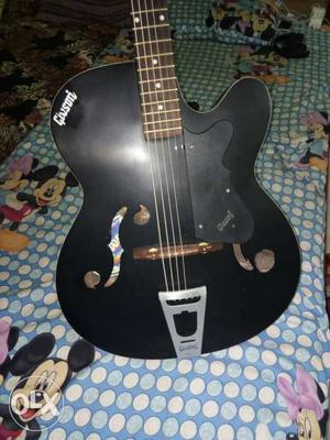 Black Gibson Acoustic Guitar