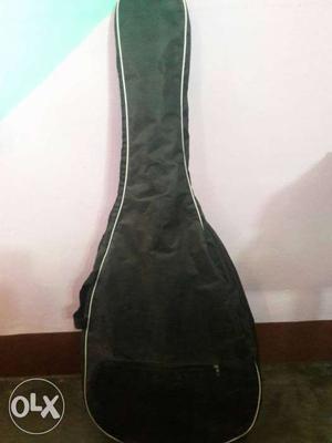 Black Guitar with bag and extra strings for sell