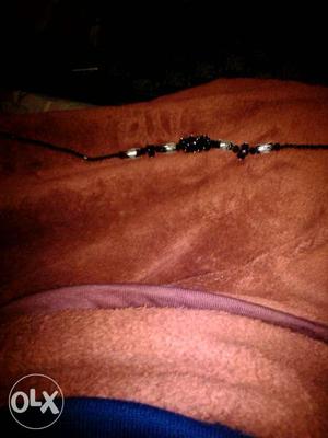 Black coloured necklace,party wear