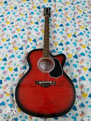 Brand New, Never Used Clapton Acoustic Guitar (Red Colour).