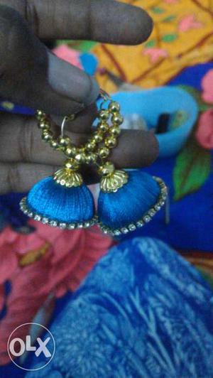 Gold-colored Pearl Beaded Blue Silk Thread Jhumka Earrings