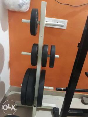 Hardly used Gym equipments. 1) 10Kg plates - 4 2)