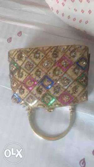 Ladies hand purse with work