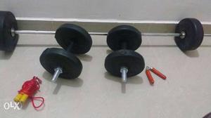 Pair Of Black Dumbbells And Barbell