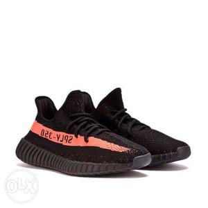 Pair Of Black-and-orange Adidas Yeezy Boost 350 SPLY V2