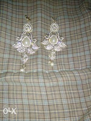 Pair Of Diamond Encrusted Dangling Earrings
