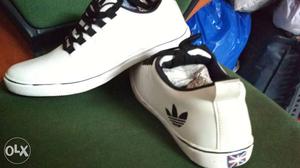 Pair Of New White-and-black Adidas Low-top Sneakers