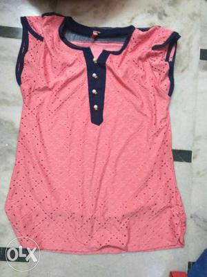 Pink top reasonable price. l size