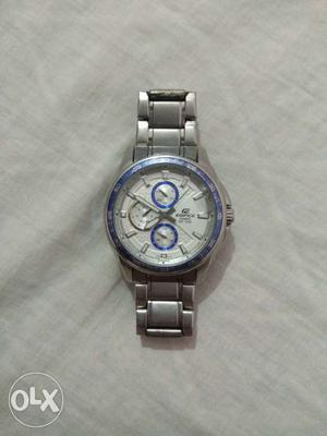 Round Silver-colored And Blue Edifice Chronograph Watch With