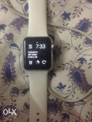 Silver Apple Watch With White Sports Band Strap