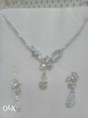 Silver-colored Necklace With Earrings