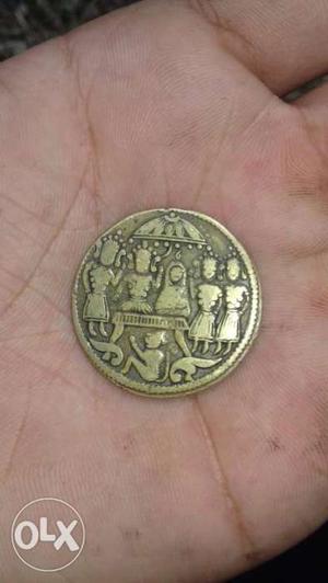This is a gold colour antique coin if anyone