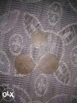 Three Gray Round Coins