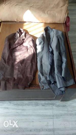 Two Brown And Black Suit Jackets