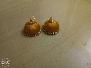 Two Brown Jhumka Earrings