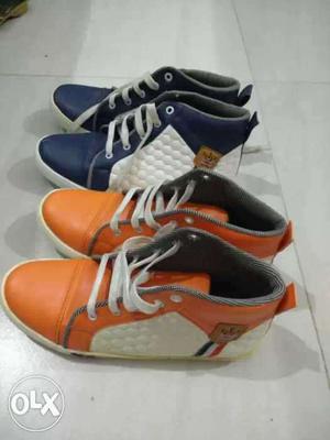 Two Pairs Of Blue And Orange High-top Sneakers