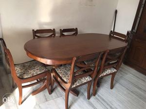 A mahogany teak dining table plus 6 chairs