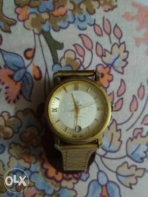A new unused watch with golden strap