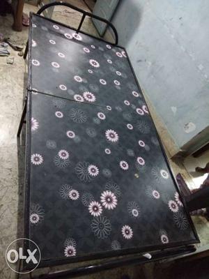 A one condition folding bed one month old urgent
