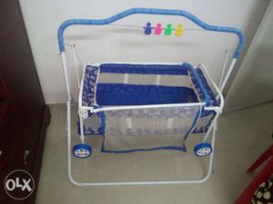 Baby's Blue And White Cradle