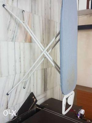 Blue Folding Ironing Board With Iron Rest
