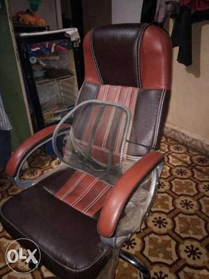 Brown And Black Leather Padded Rolling Armchair